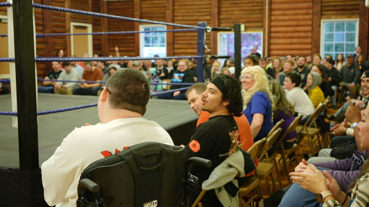 fans at wrestling match