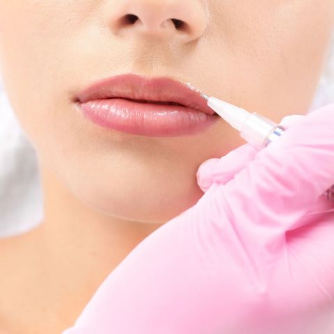 a woman getting permanent lipstick done Kickstart Your Beauty Career 4.jpg