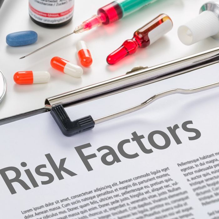 risk factors paper on clipboard
