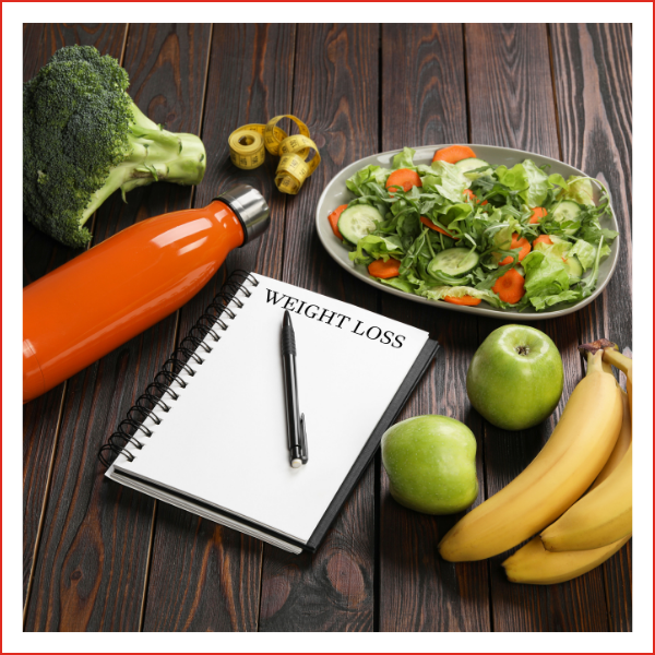 healthy food, water and a journal