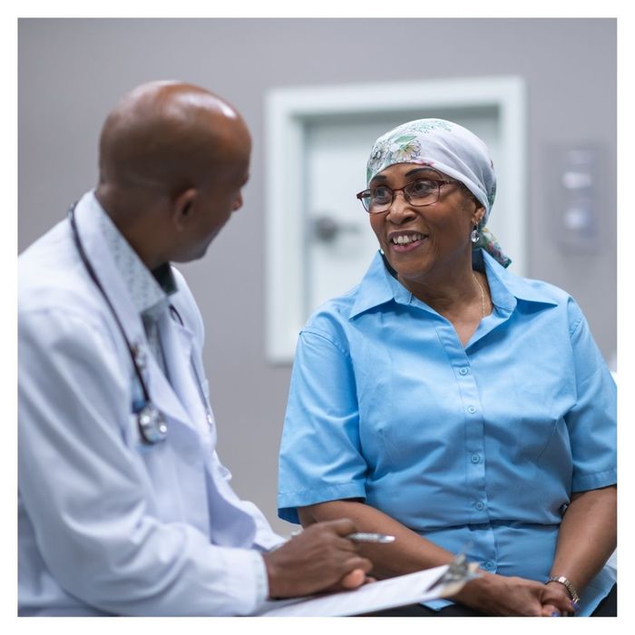 woman talking with doctor