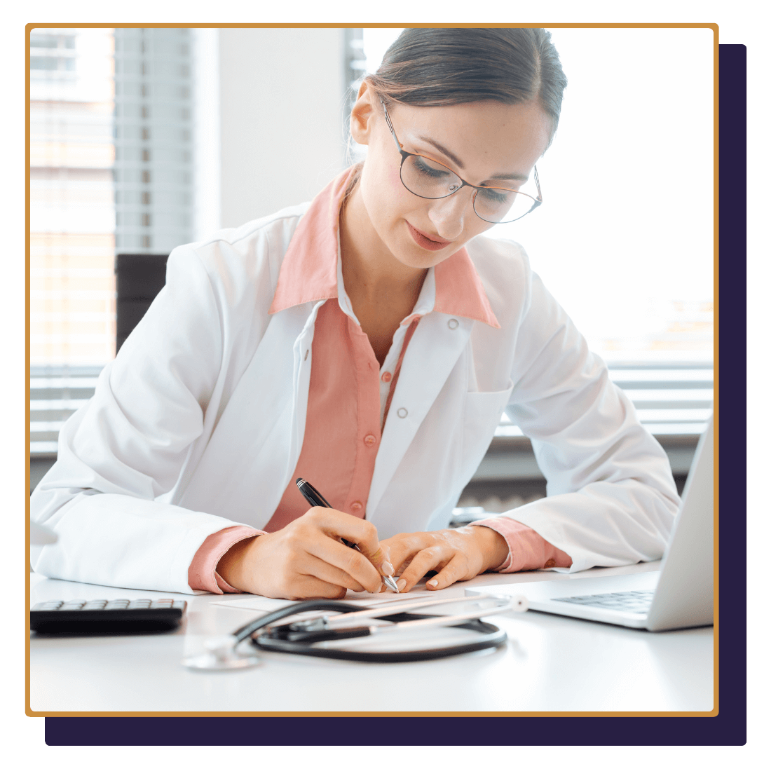 doctor taking notes, looking over finances doctor taking notes, looking over finances