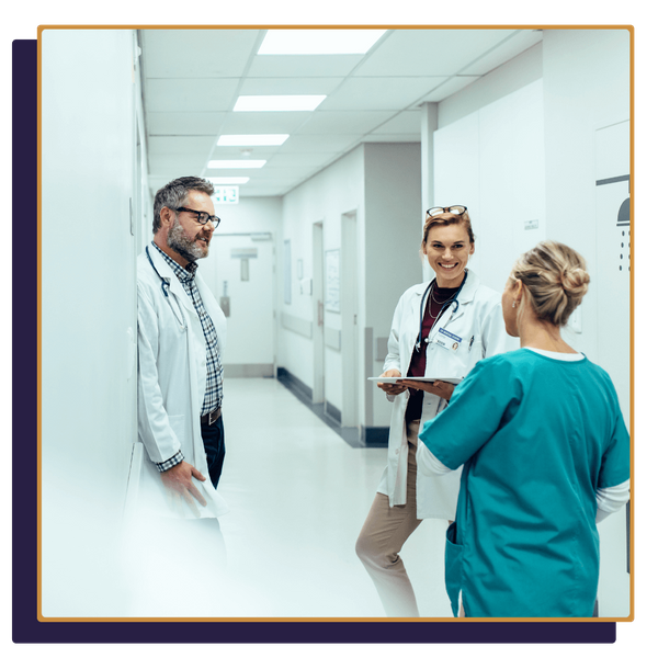 medical team talking with each other medical team talking with each other
