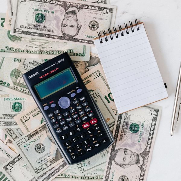 money and a calculator money and a calculator