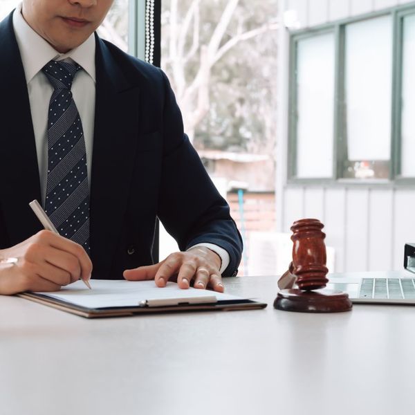 lawyer filling out paperwork lawyer filling out paperwork