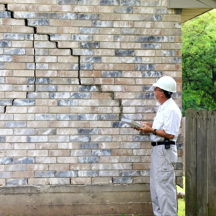 foundation expert inspecting foundation