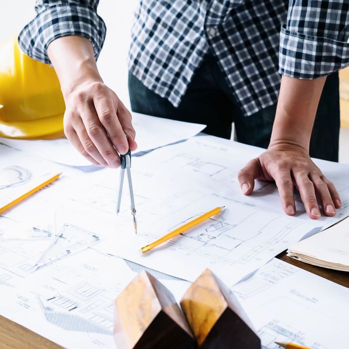 Construction worker going over documents