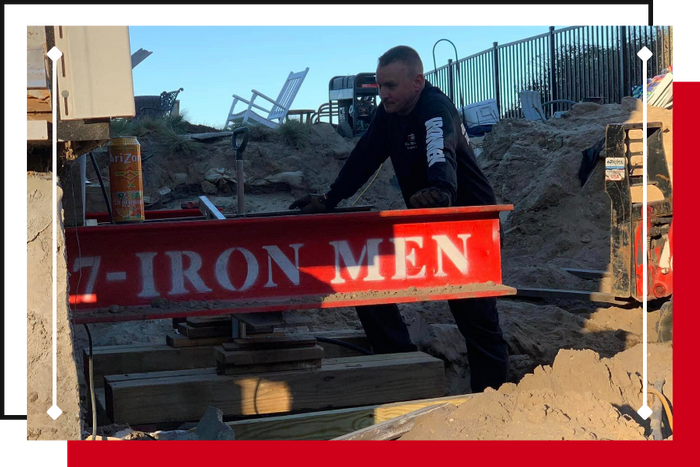 team member installing an i-beam