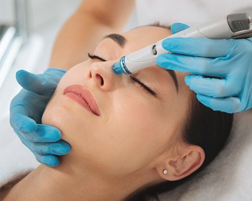 Image of a woman getting Hydrafacial