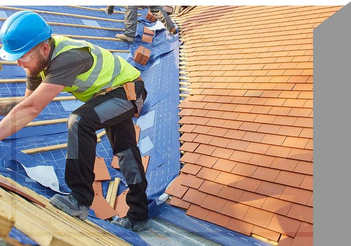 roofer installing a roof