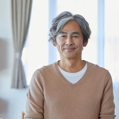 middle-aged man smiling at camera