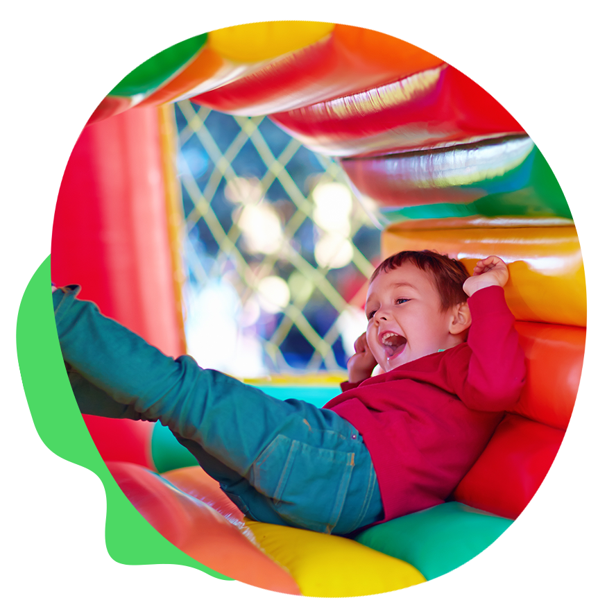 A boy having fun in an inflatable tunnel