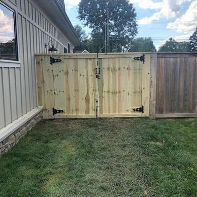 new wooden fence gate