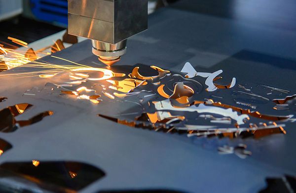 Laser cutting metal sheet