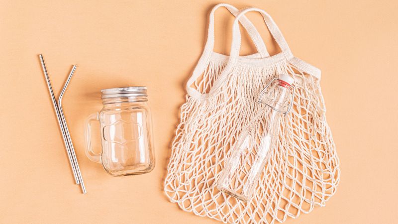 a reusable bag and glassware laid out