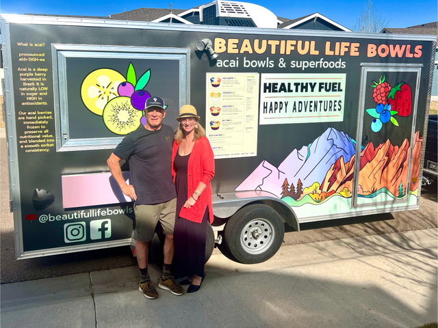 Doug and Tammi in front of the food truck