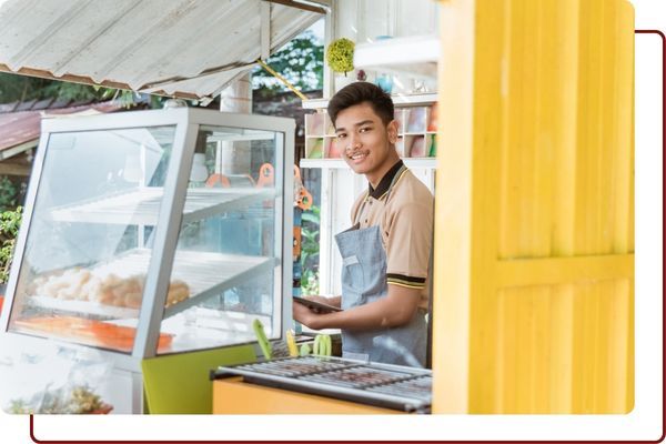 a man running a shop Business Lines of Credit (2).jpg