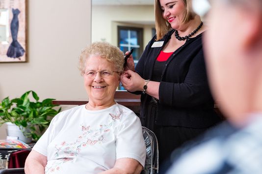 patient in salon getting a haircut