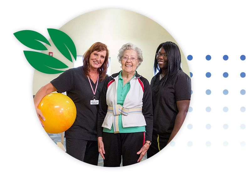 patient in physical therapy with nurses