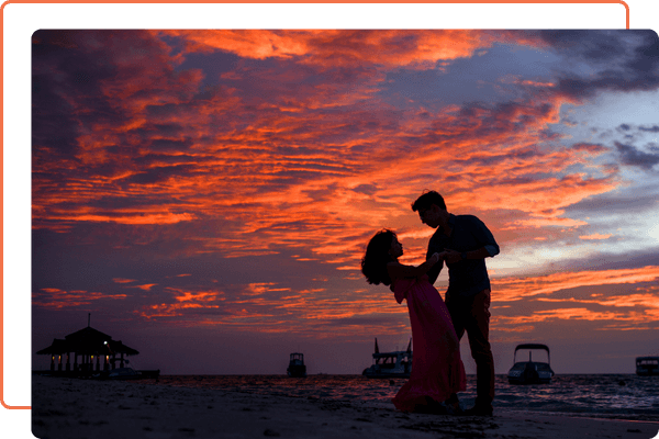 Couple dancing on beach