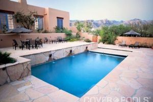 Outdoor pool cover with mountains in background