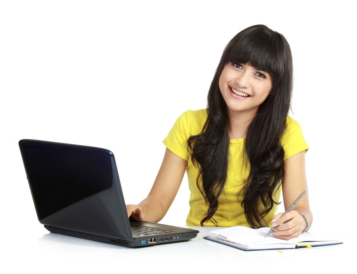 smiling girl at computer.jpg