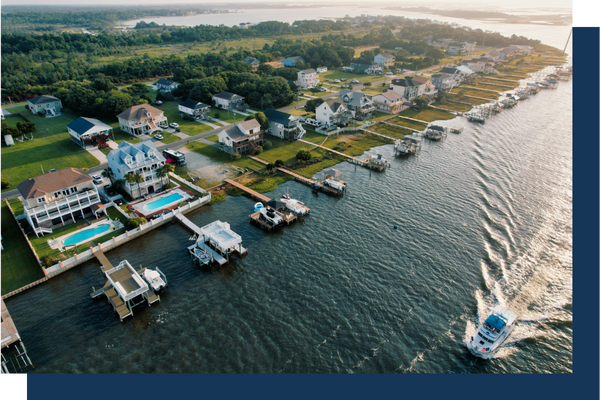 aerial shot of water front homes