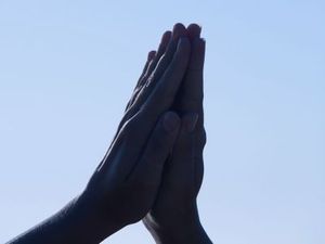 Hands praying