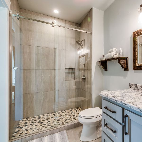 remodeled bathroom with sliding door