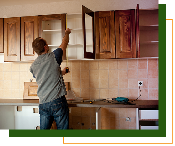 Man working on cabinetry