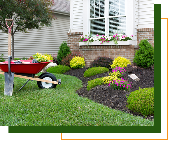 Wheelbarrow next to landscaped area