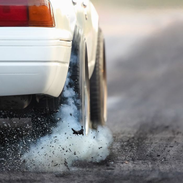 white car tearing up track