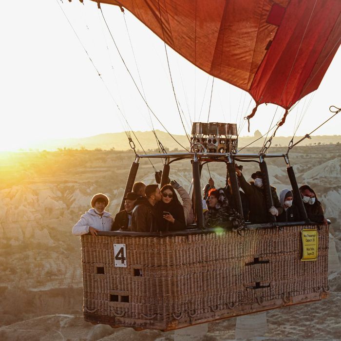 group of people enjoying a hot air balloon ride