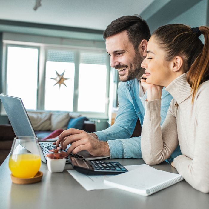 couple looking at a budget
