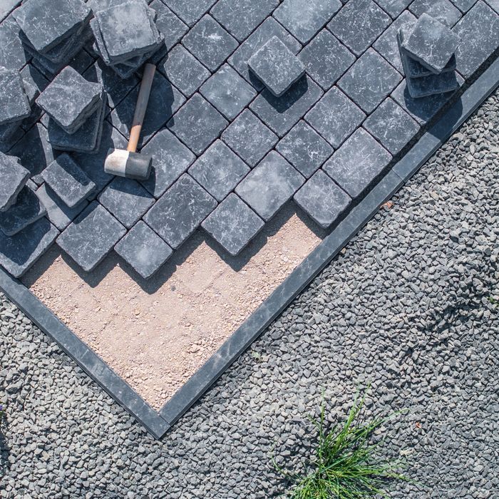 paver stones being installed