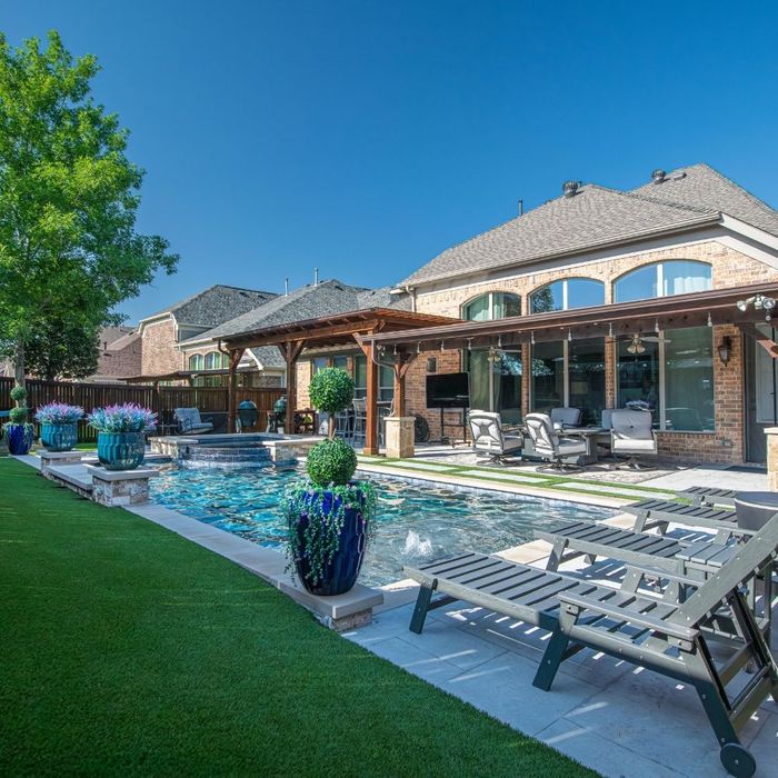 A backyard with a pool