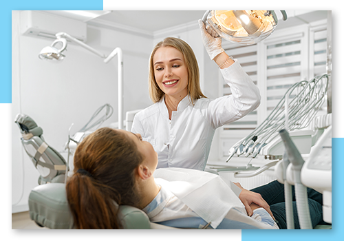 a woman in the dentist office for treatment