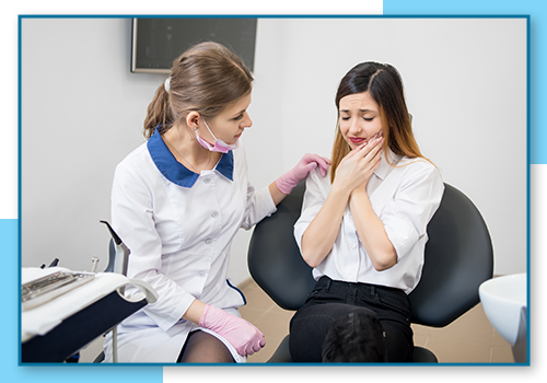 Woman in pain at dentist