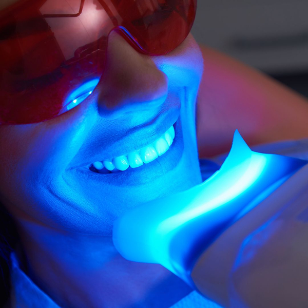 lady having her teeth whitened