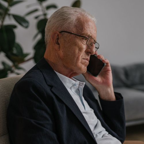 older man on the phone