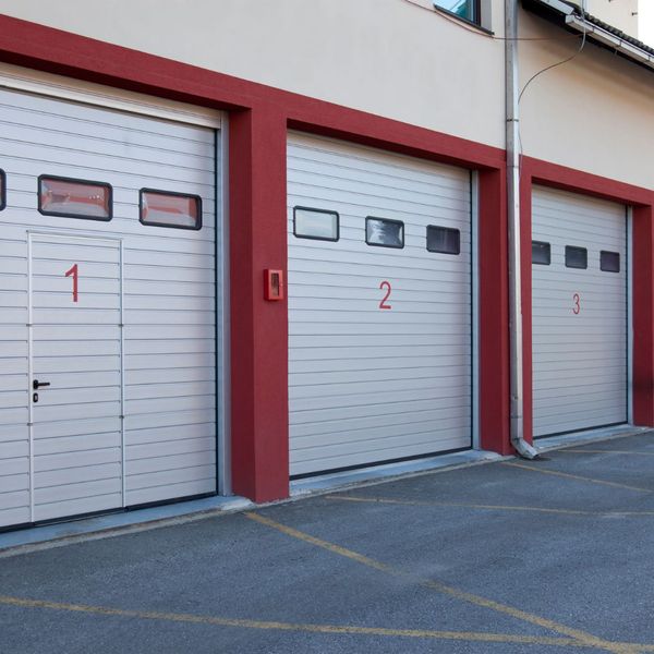 three loading commercial garage doors