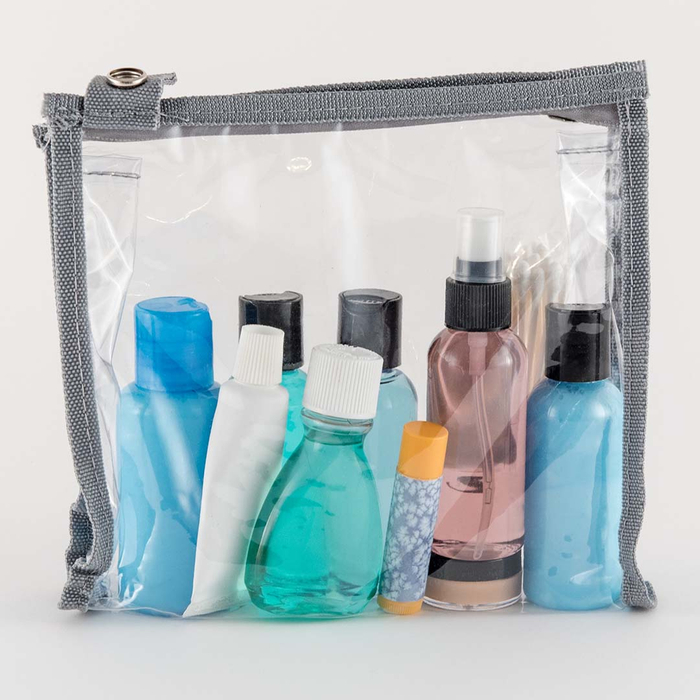 a plastic container full of toiletries