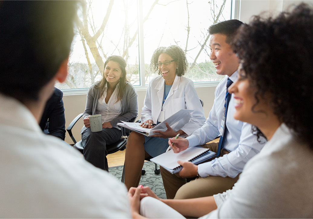 Image of dentist in a conference