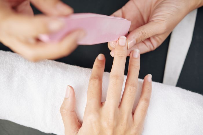 manicurist-filing-nails-DB6UW8L.jpg