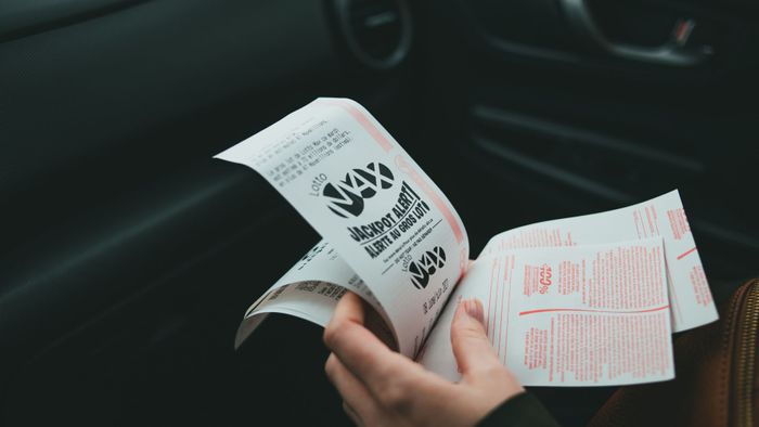 holding lottery tickets