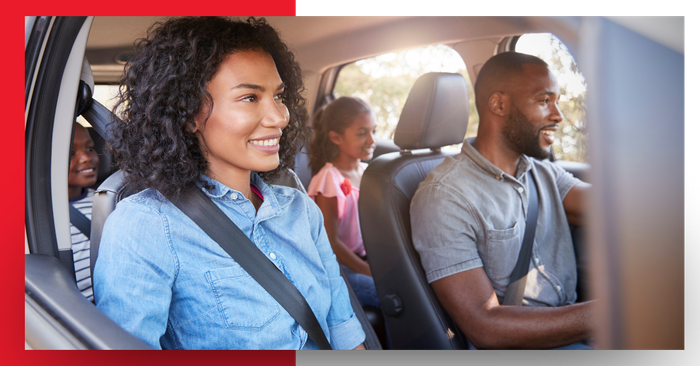 family driving in car