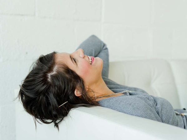 confident woman smiling and relaxed