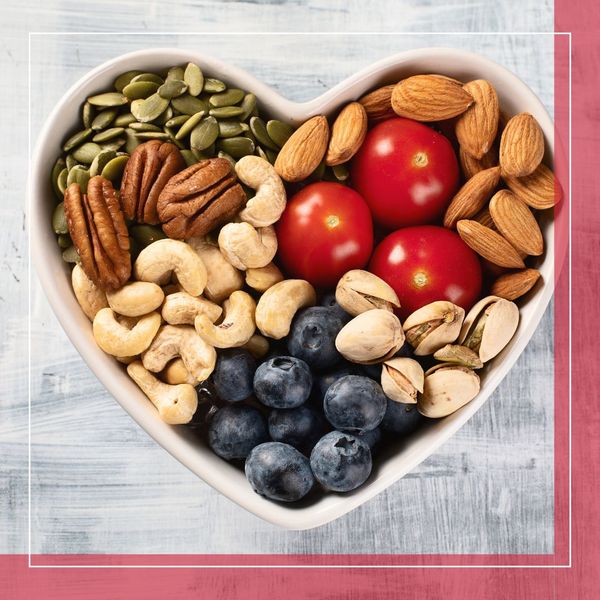 a bowl of nuts and fruits