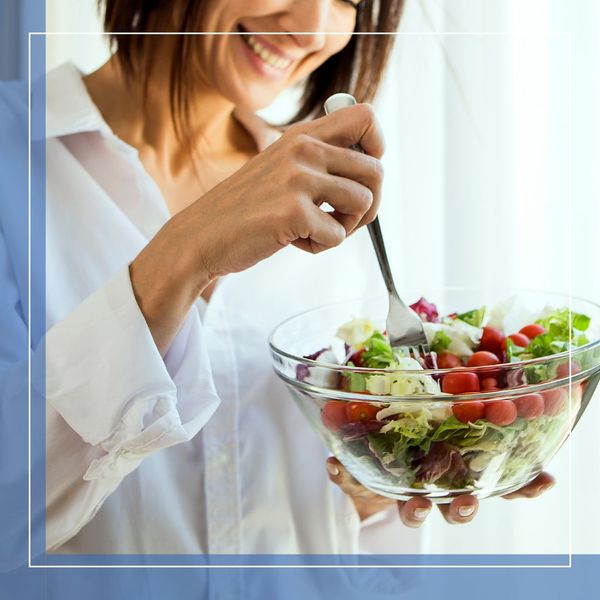 woman eating a salad