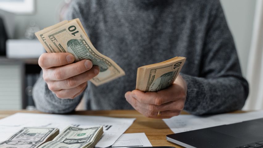 Person counting money